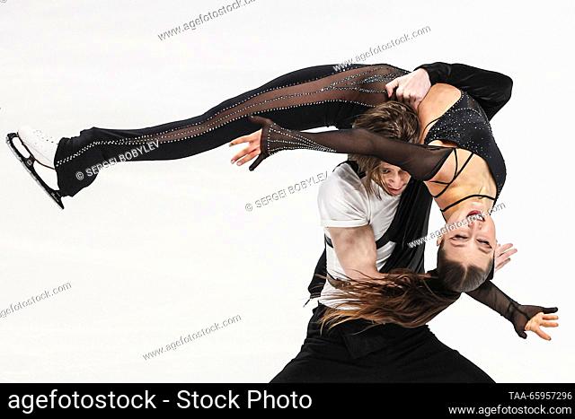 RUSSIA, CHELYABINSK - DECEMBER 21, 2023: Ice dancers Irina Khavronina and Devid Naryzhnyy perform their rhythm dance during the ice dance event of the 2024...