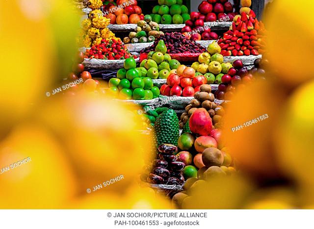 Piles of fruits (apples, pears, mangos, strawberries, guanabanas etc.) are seen arranged at the fruit market of Paloquemao in Bogota, Colombia, 25 November 2017