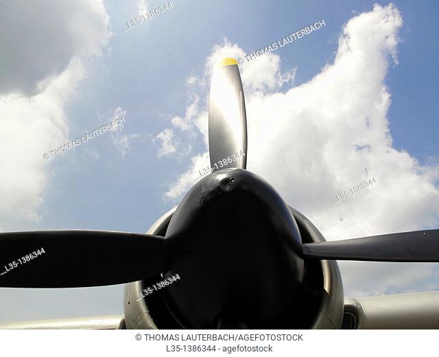 Propeller and white clouds