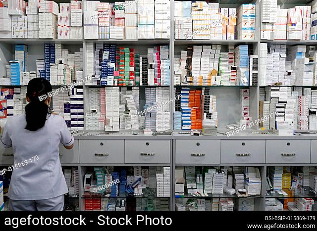 Hospital pharmacy. Pharmacist at work. Tam Duc Cardiology Hospital. Ho Chi Minh City. Vietnam