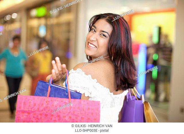 Young woman shopping in mall, KwaZulu Natal Province, South Africa