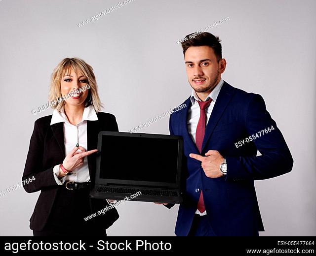 Business staff show business results on computer