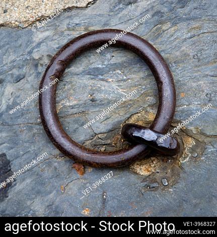 letter q, Q photographic composition of iron ring on stone of the creative alphabet