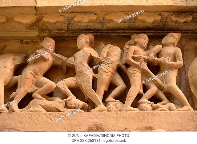 Ruined sculptures of war at Lakshmana Temple, Khajuraho, Madhya Pradesh, India, Asia