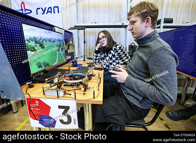 RUSSIA, ST PETERSBURG - MARCH 16, 2023: Students of GUAP St Petersburg State University of Aerospace Instrumentation test a quadcopter (FPV drone) in a lab