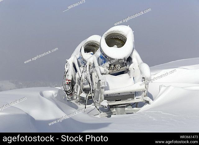 Austria, Carinthia, Snow cannon covered with snow