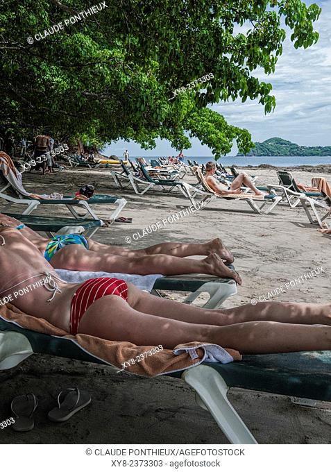 Vacationists relaxing at Occidental Grand Papagayo Resort beach, Guanacaste, Costa-Rica