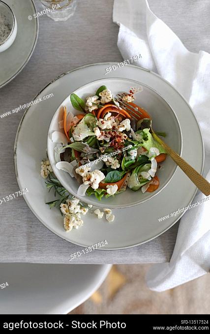 Salad with salted rosemary popcorn