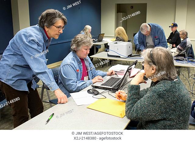 Harper Woods, Michigan - Volunteers from the AARP prepare income tax returns for low- and moderate-income senior citizens