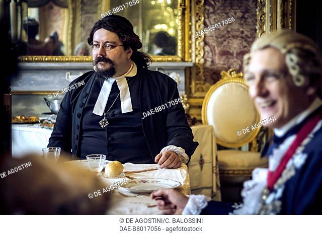 Nobleman and a prelate at table, court life in the Stupinigi hunting lodge, Italy, 18th century. Historical re-enactment