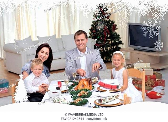 Composite image of family celebrating christmas dinner with turkey