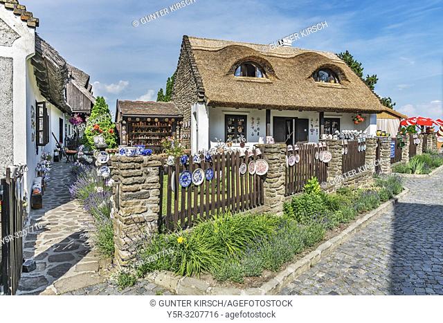 Old farmhouse with thatched roof. Cups and plates are sold, Tihany, Veszprem county, Central Transdanubia, Hungary, Europe