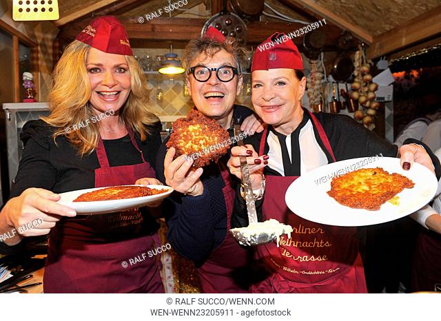 German celebrites are making potato cakes for the charity organization Kinderherz at the christmas market at Gedaechtniskirche in Berlin Featuring: Maren Gilzer