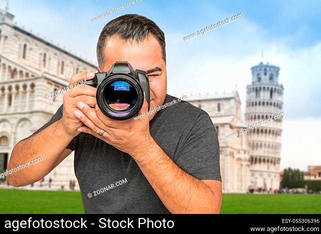 Hispanic Male Photographer With Camera at Leaning Tower of Pisa