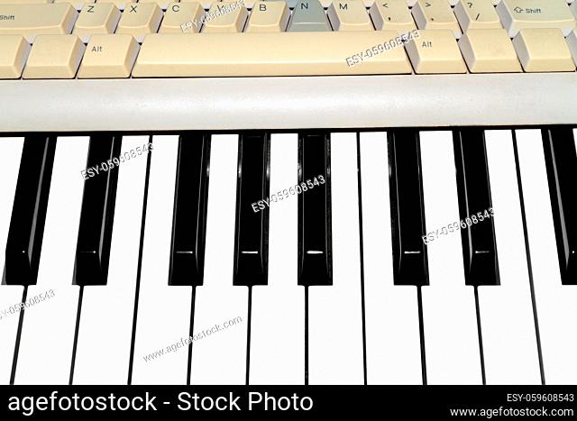 Parts of computer and music keyboards close-up