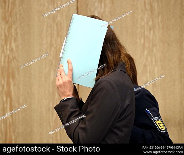 06 December 2023, Baden-Württemberg, Mannheim: The defendant in the trial for the alleged murder of her two children waits in a courtroom at Mannheim District...