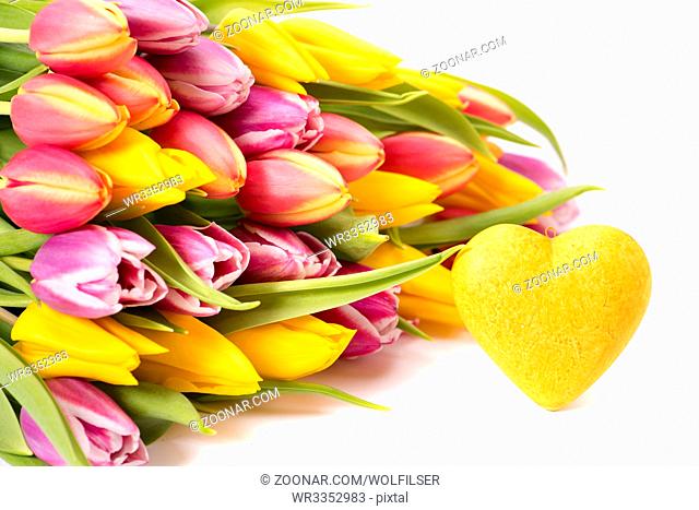 bunch of flowers as present for holiday with heart