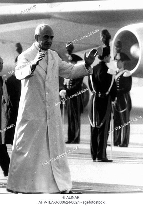 Pope Paul VI descends from an airplane during an official visit, shot 1970 ca. by Team