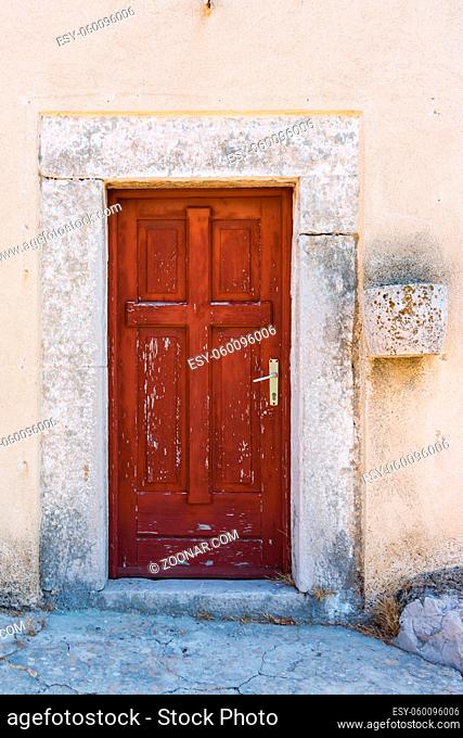 Old Ancient Ruined Worn Eroded Red Door on Side of Cathedral Beautiful Medieval Vintage Architectural Feature