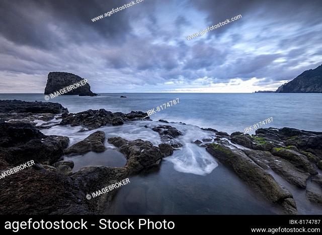 Rock coast, volcanic rock formations, sunset, coast near Porto da Cruz, Madeira, Portugal, Europe
