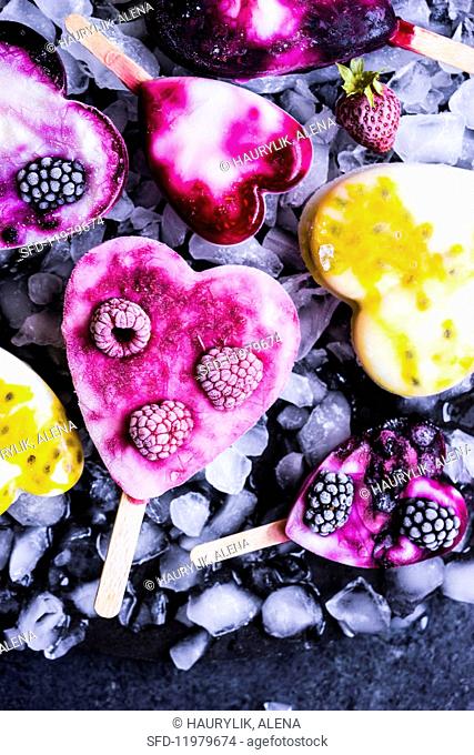 Various fruity heart-shaped ice lollies