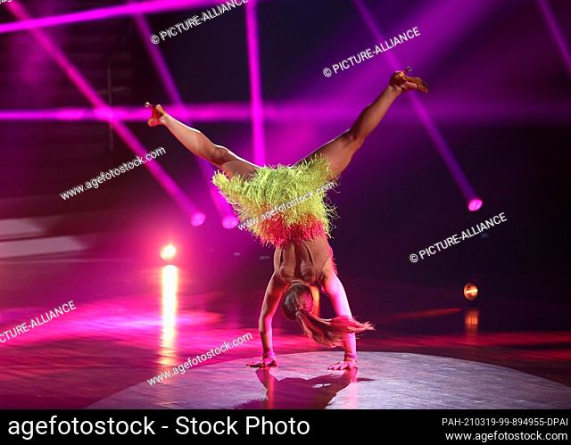 19 March 2021, North Rhine-Westphalia, Cologne: Lola Weippert, presenter, dances jive to ""Wannabe"" in the third round of the RTL dance show ""Let's Dance""...