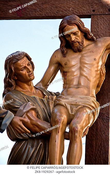 Wood carving of cedar of Spanish sculptor Victor de los Rios, represents the descent from the cross when Jesus was crucified, holy week in Spain