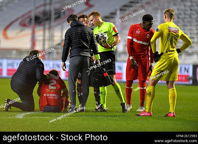 Antwerp's Ritchie De Laet gets injured during a soccer match between Royal Antwerp FC and SV Zulte Waregem, Wednesday 16 December 2020 in Antwerp