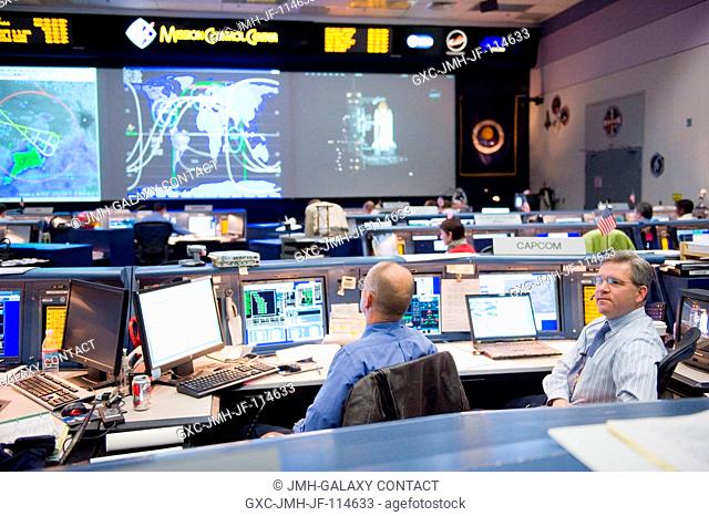 An overall view of the space shuttle flight control room in the Johnson Space Center's Mission Control Center during launch countdown activities a few hundred...
