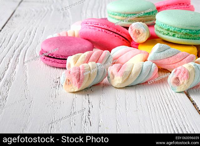 Pile of sweets on table corner
