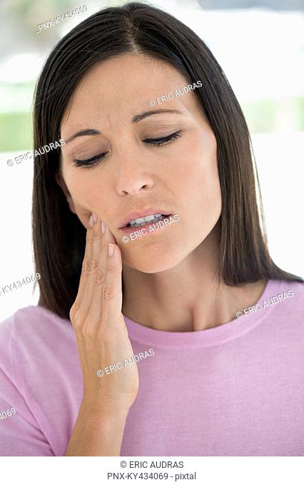 Woman suffering from a toothache