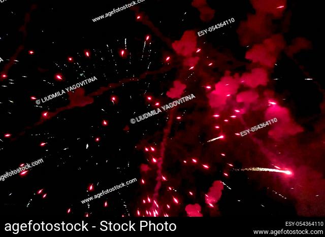 New Year's fireworks, inside view of the fireworks, colorful flashes of pyrotechnics