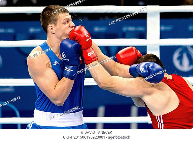 Czech boxer Daniel Taborsky, left, and Yan Sudzilouski (BLR) fight in Men's Super Heavy Round of 16 match at the Baku 2015 1st European Games in Baku