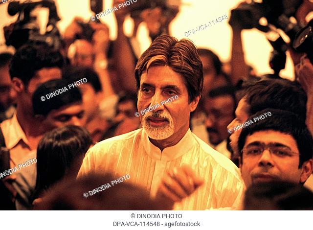 South Asian Indian Bollywood actor Amitabh Bachchan at an exhibition of sculptor Arzan Khambatta at Jehangir art gallery ; Bombay Mumbai  ; Maharashtra ; India...