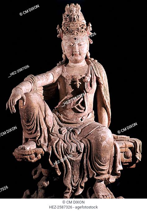 Late Sung dynasty Chinese statuette of Kuan-Yin, a goddess of mercy, as a Bodhisattva (Buddha-to-be) in wood with traces of gilt and painting