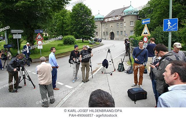 People and journalists wait in front of the prison in Landsberg am Lech, Germany, 02 June 2014. According to media reports on 02 June 2014, Hoeness