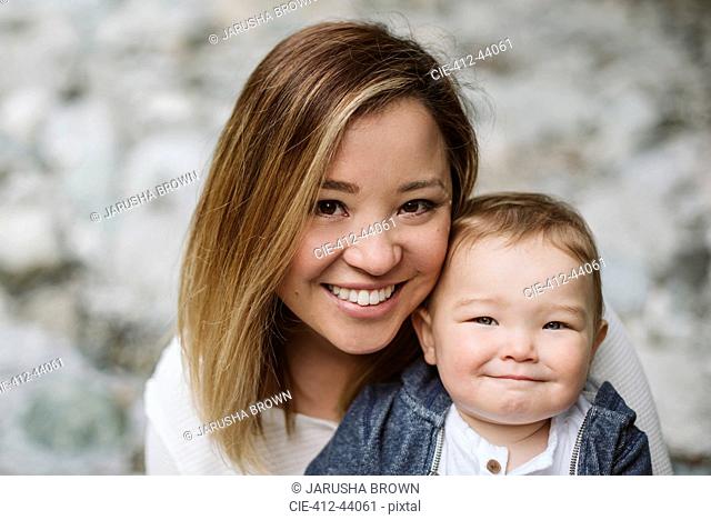 Portrait smiling mother and cute baby son