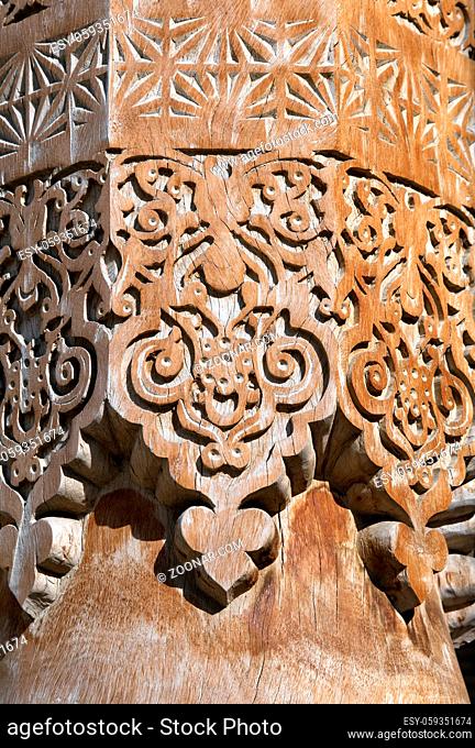 Detail of traditonal carved wooden column, Uzbekistan