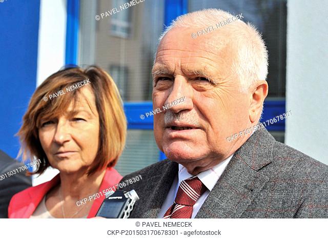 Former president Vaclav Klaus speaks with journalists in front of the seat in Pribram, central Bohemia, Czech Republic, on March 17, 2015
