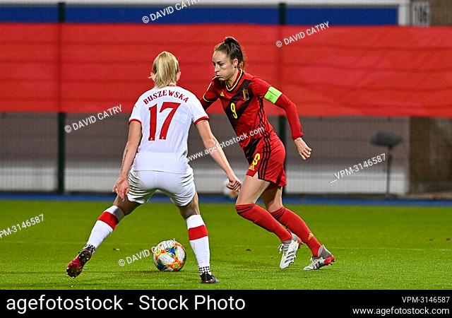 Poland's Zofia Buszewska and Belgium's Tessa Wullaert pictured in action during a soccer game between Belgium's national team the Red Flames and Poland
