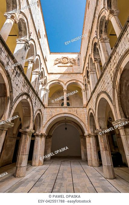 Arched inner courtyard in Sponza Palace in Dubrovnik Old Town, Croatia