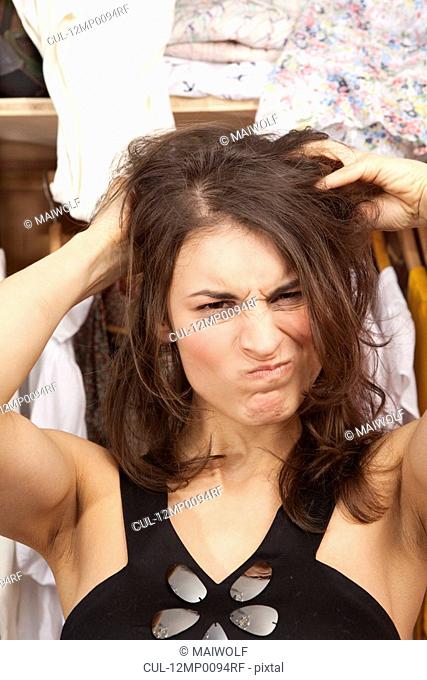 woman tearing her hair