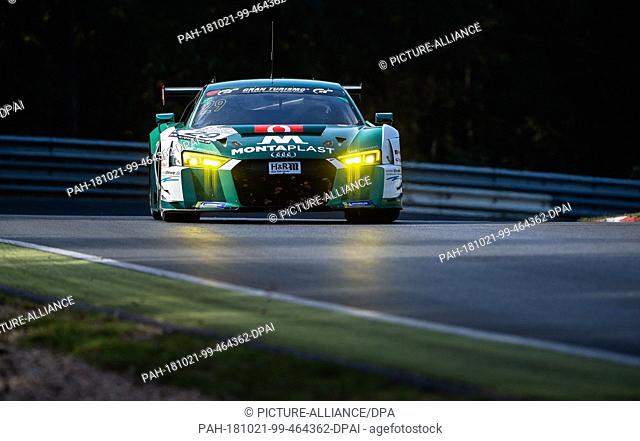 20 October 2018, Rhineland-Palatinate, Nuerburg: The Audi R8 LMS with Sheldon Van Der Linde and Christopher Mies from Team Montaplast by Land-Motorsport drives...
