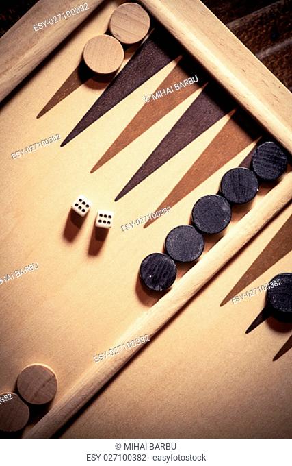 Backgammon board with double six dice, shot from above