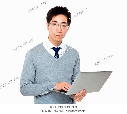 Asian businessman use of laptop computer