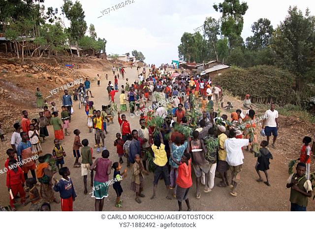 Village parade on the main road from Konso to Arfaide, Lower valley of the Omo river, Ethiopia, Africa