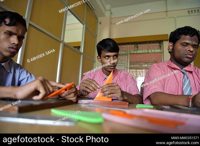 Visually impaired students studying during a special class on the eve of International Literacy day at the Institute for the empowerment of persons with visual...
