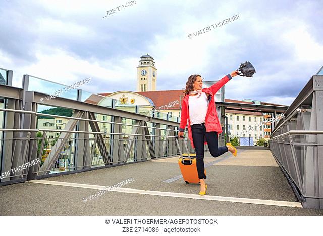 portrait of a young woman at bus and rail station