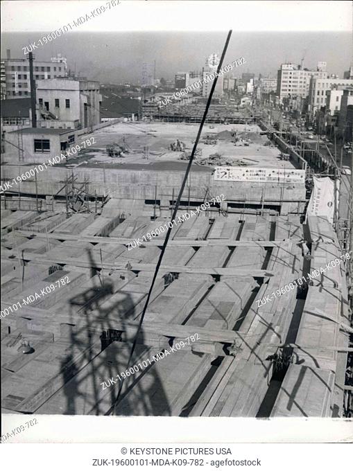 Jan. 01, 1960 - One of the last sections to be completed. The continuous roof of the building stretching in a near straight line will serve as a fast highway...