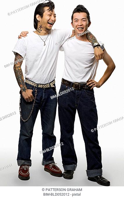 Two Asian men in rockabilly clothing